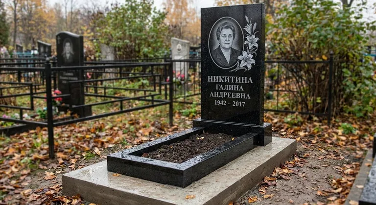Памятник с гравировкой лилий — выполненная работа «Никитина» в Альметьевске