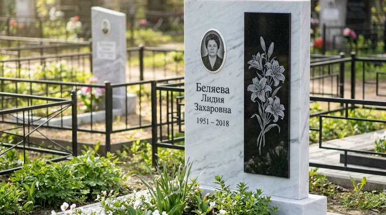 Памятник с гравировкой лилий — выполненная работа «Беляева» в Альметьевске