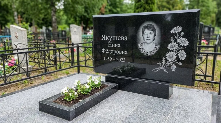 Памятник с гравировкой ромашек — выполненная работа «Якушева» в Альметьевске