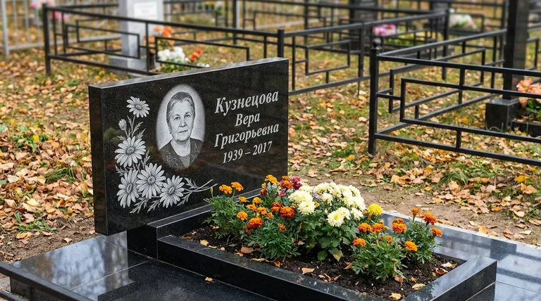 Памятник с гравировкой ромашек — выполненная работа «Кузнецова» в Альметьевске