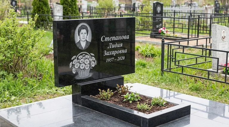 Памятник с гравировкой ромашек — выполненная работа «Степанова» в Альметьевске