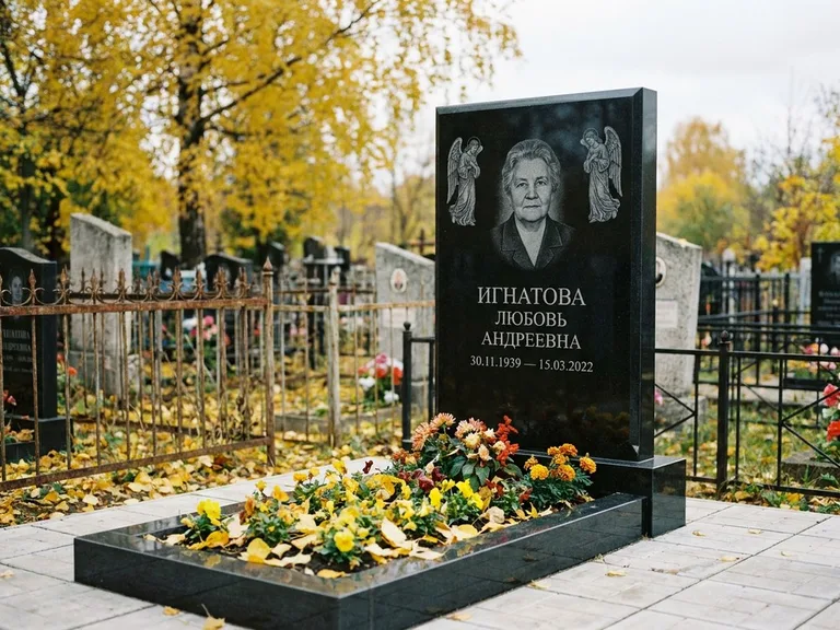 Памятник с гравировкой ангела — гравировка двух ангелов по сторонам портрета, работа «Игнатова» в Альметьевске