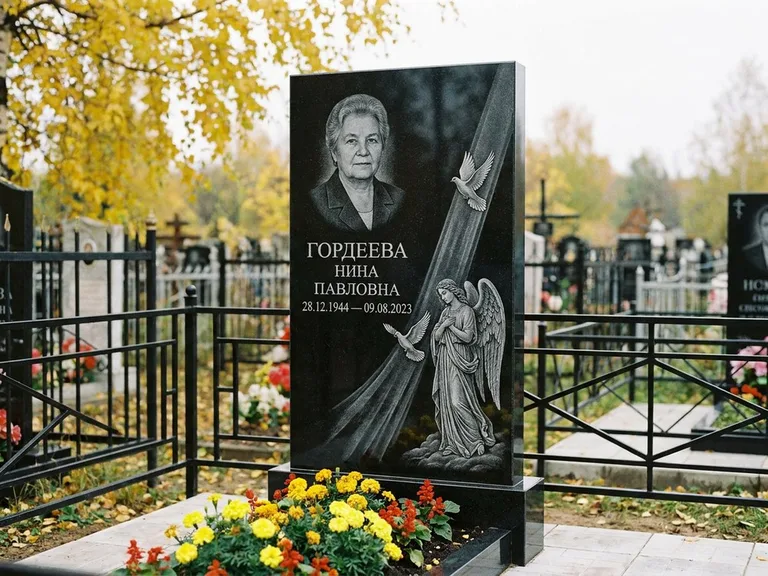 Памятник с гравировкой ангела — гравировка ангела с голубем по диагонали стелы, работа «Гордеева» в Альметьевске